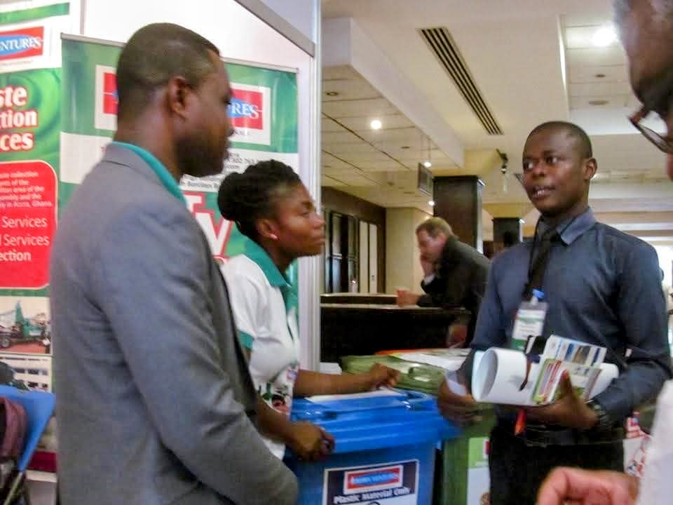 Exhibition visitors exploring JVL's waste-to-resource products